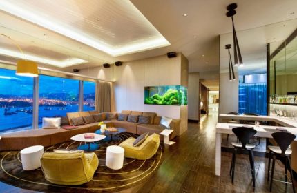 W Hong Kong hotel suite interior. Luxury gay hotel in Hong Kong city center with a view, aquarium, and modern design. Upscale travel.