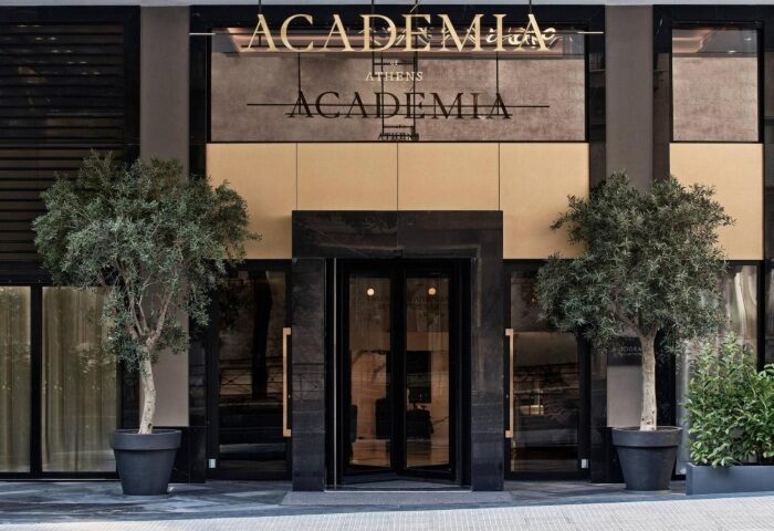 Academias Hotel, Autograph Collection entrance. Luxury gay hotels Athens. Elegant facade with olive trees. Best Athens hotel.