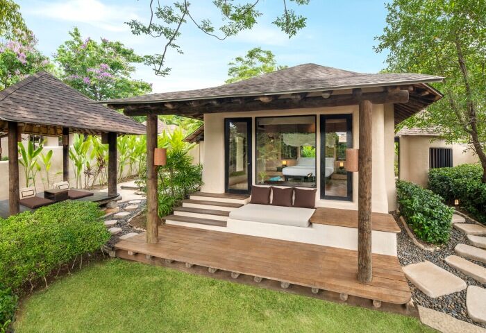 The Naka Island Phuket pool villa. Luxury honeymoon, gay hotel with private deck and outdoor seating. Best gay travel destination.