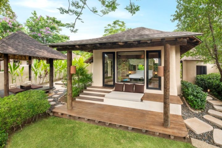 The Naka Island Phuket pool villa. Luxury honeymoon, gay hotel with private deck and outdoor seating. Best gay travel destination.