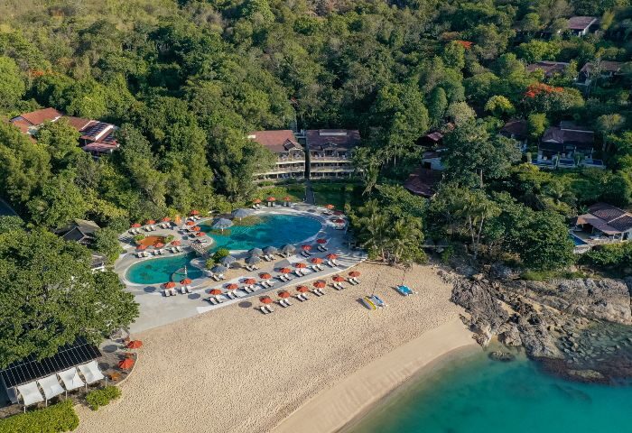 Garrya Tongsai Bay, Koh Samui gay hotel. Beachfront view of private pool villas, sandy beach, and lush greenery. Best gay travel destination.