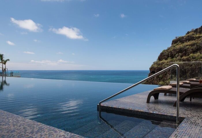 Saccharum Hotel Madeira rooftop spa. Infinity pool overlooking the ocean. Best gay hotel in Portugal for relaxation and views.