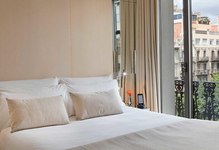 Hotel Cram Barcelona room. A gay-friendly hotel near gay nightlife. Balcony view, modern design, comfortable bed. Best update this year.