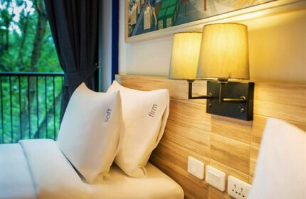 Holiday Inn Express Krabi Ao Nang Beach hotel room. Pillows labeled soft and firm. Best value money gay Krabi hotel.