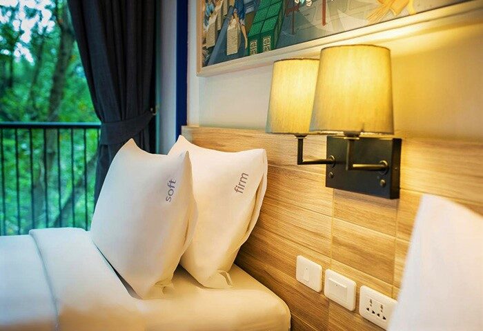 Holiday Inn Express Krabi Ao Nang Beach hotel room. Pillows labeled soft and firm. Best value money gay Krabi hotel.