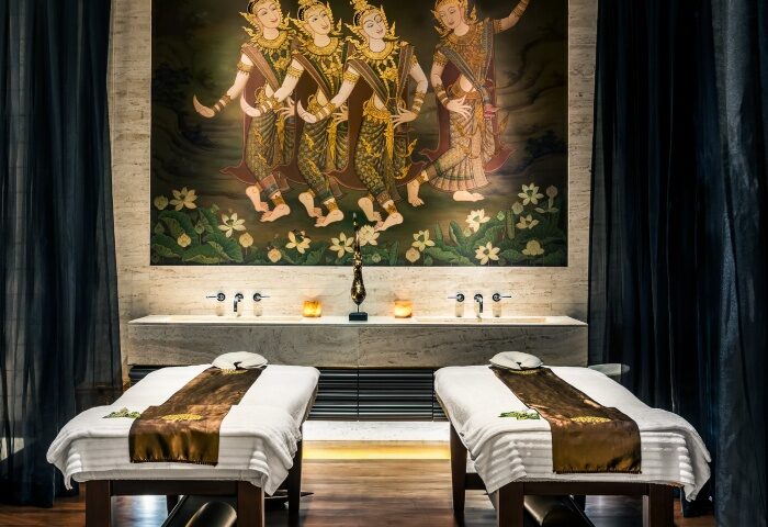Pullman Bangkok King Power spa. Gay-friendly wellness hotel near gay saunas. Massage beds and Thai art. Best wellness gay hotels in Bangkok.