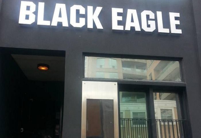 Black Eagle cruising bar in Toronto. Exterior shot of the popular gay bar, a nightlife destination for gay men visiting Toronto.