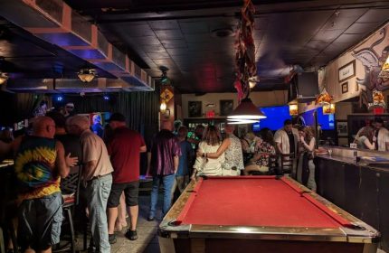 Bobby's Monkey Bar in Key West. Gay bar with karaoke, drinks, and a pool table. A popular spot for gay men's travel.
