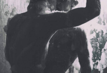 Two men in a shower at BodyBreath Cruise Club Tokyo, a gay cruise club. The photo is in black and white, with soap covering their bodies.