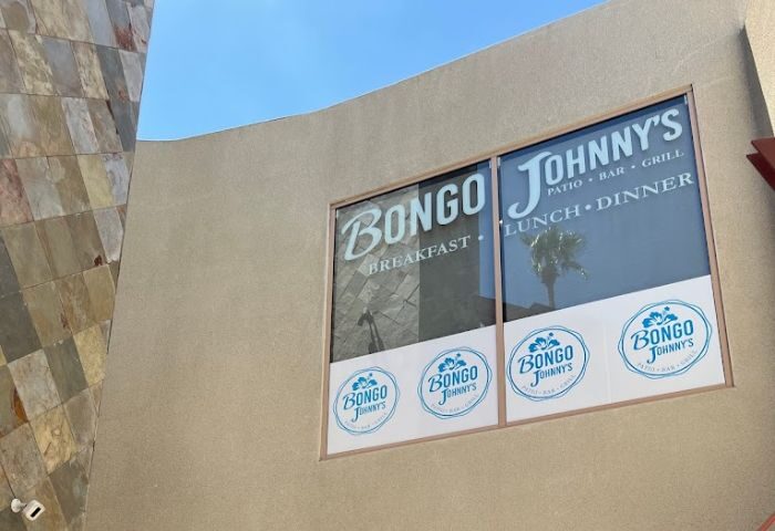 Bongo Johnny's Patio Bar & Grill exterior. Gay Palm Springs travel advice. Restaurant serves breakfast, lunch, and dinner. Patio and bar.