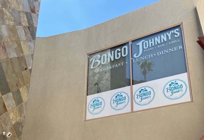 Bongo Johnny's Patio Bar & Grill exterior. Gay Palm Springs travel advice. Restaurant serves breakfast, lunch, and dinner. Patio and bar.
