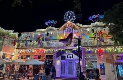 Bourbon St. Pub, Key West's gay bar with live music. Rainbow flags, lights, & a giant shoe decorate the building. Nightlife scene.