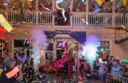 Key West's Bourbon St. Pub: Gay bar with live music, drag queens, and confetti. A vibrant scene for gay men's travel adventures.