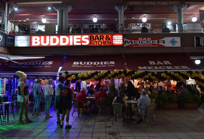 Buddies Bar, a popular gay bar in Gran Canaria, features outdoor seating and a lively atmosphere. A welcoming spot for gay men travelers.