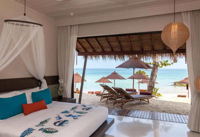 Buri Rasa Koh Phangan beachfront hotel room. Sea view, sunbeds, umbrellas. Gay travel in Thailand. Tropical resort, luxury stay.