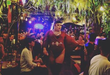 Drag show at Cafe Dalida, Taipei. Trendiest gay bar in the city with a large crowd enjoying the performance. Nightlife for gay men in Taiwan.