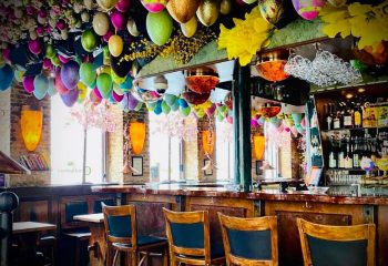Centralhjørnet Copenhagen bar interior. Easter eggs hang from ceiling. Gay travel advice for Copenhagen's oldest gay bar.
