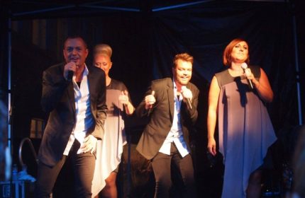 Centralhjornet Copenhagen: Band performs live on stage. Gay nightlife in Copenhagen. Travel advice for gay men. Music and entertainment.