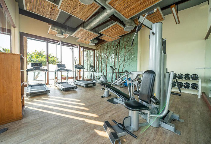 Le Vimarn Cottages & Spa gym. Boutique beachfront hotel in Koh Samet with treadmills, weights, and exercise machines. Gay travel advice.