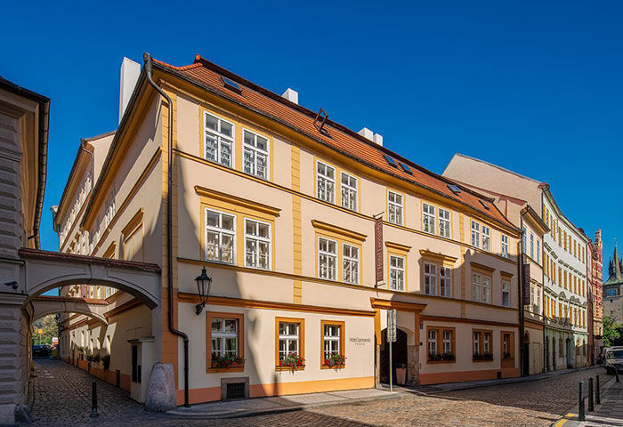 Hotel Leonardo Prague near Charles Bridge. A cheap gay-friendly hotel with a traditional facade on a cobblestone street in Prague.