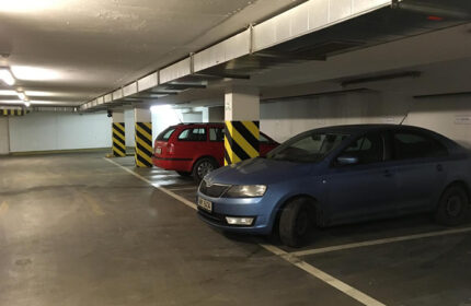 Arkada Hotel Praha's car park. Cheap gay hotels in Prague's gayborhood, Vinohrady, offer parking. Cars parked in the underground garage.