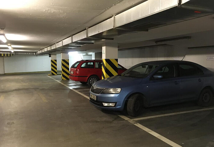 Arkada Hotel Praha's car park. Cheap gay hotels in Prague's gayborhood, Vinohrady, offer parking. Cars parked in the underground garage.