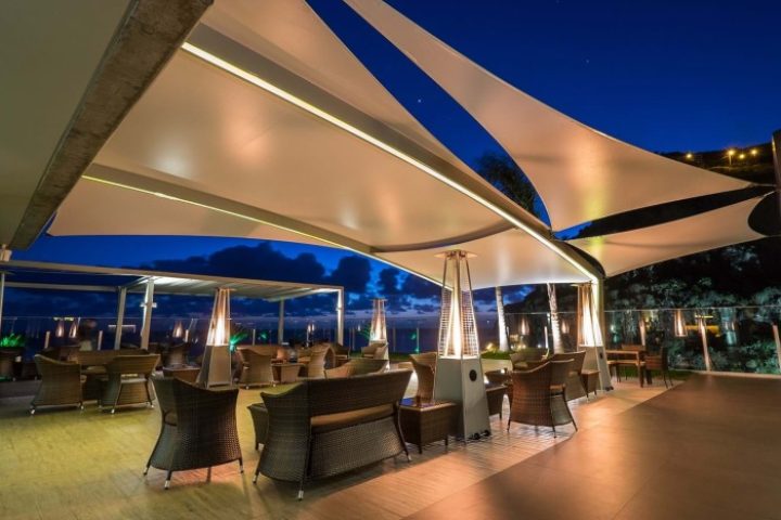 Saccharum, Madeira hotel's outdoor lounge at night. Cheap luxury beachfront spa hotel in Portugal. Gay travel advice.