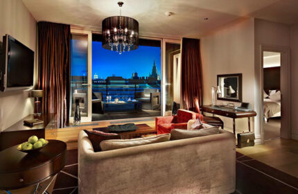 Luxury suite at The Grand Mark Prague Hotel near the gayborhood. Balcony view of Prague. Instagramable hotel for gay men travel advice.