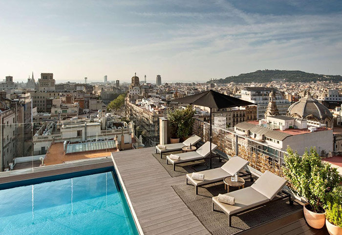 Rooftop infinity pool at NH Collection Barcelona Gran Hotel Calderon. Great views of Barcelona. Perfect for gay travelers. Cheap price!