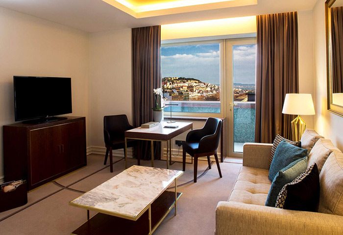 Tivoli Avenida Liberdade, Lisbon gay hotel room. Luxury interior with city view. Gay travel in Lisbon, Portugal. Leading Hotels of the World.