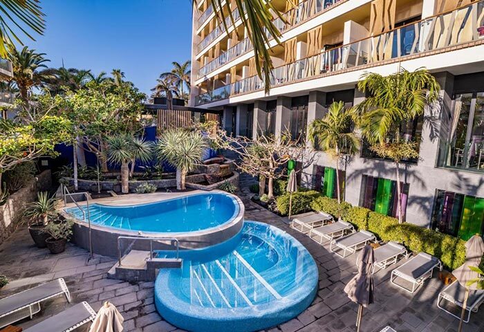 Bohemia Suites & Spa adults-only gay hotel pool in Playa del Ingles. Luxury gay beach hotel with cheap price and spa in Gran Canaria.