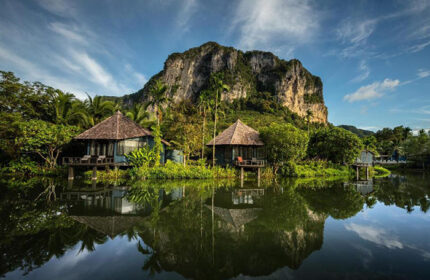 Peace Laguna Resort Krabi: Private pool villas reflected in water. Gay-friendly hotel with cheap rates, ideal for gay men travel.
