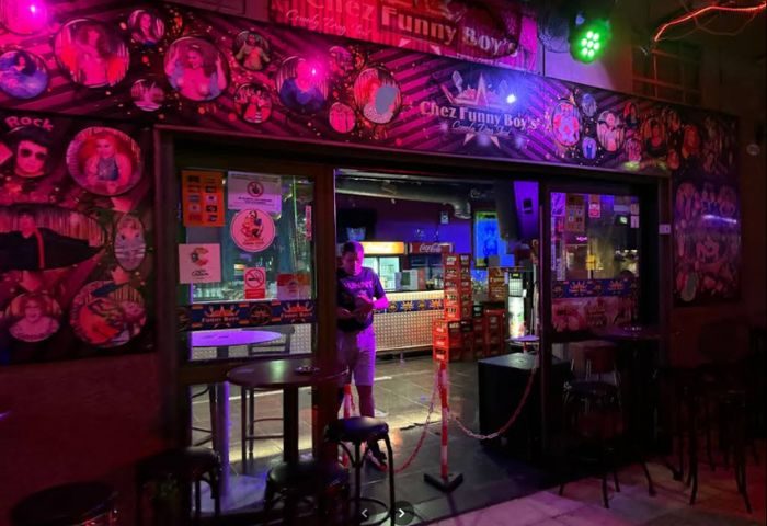 Chez Funny Boy's gay bar in Gran Canaria. Entrance view of the popular gay bar, decorated with colorful images and neon lights. Gay travel destination.