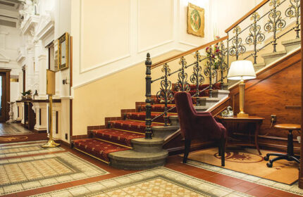 Staircase at Boutique Hotel Seven Days, a chic gay hotel in Prague's Vinohrady gayborhood. Elegant design, luxurious travel experience.