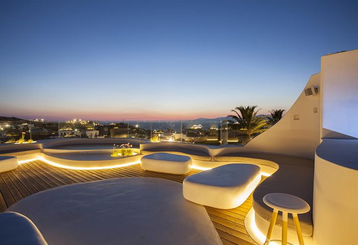Andronikos Hotel, Mykonos: Chic design at this upscale gay hotel. Rooftop seating area with city view at dusk. Ideal for gay men's travel.
