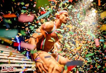 Man in rainbow harness at Circus Arena Vienna. Confetti falling. Gay travel advice. Circus-arena-vienna.jpg.