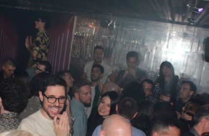 Crowd at Plastic Club Milano, a gay-friendly nightclub. People dancing, socializing, and enjoying the vibrant atmosphere. Nightlife in Milan.