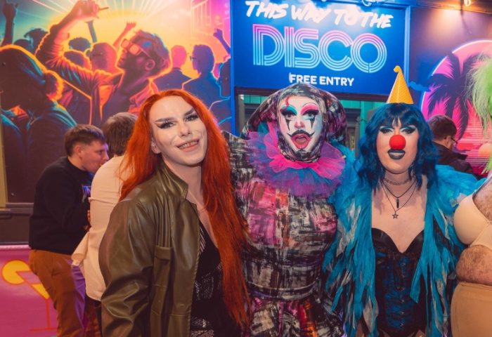 Drag queens at Club Tropicana Manchester. Nightlife scene, disco entry. Gay travel advice, Manchester's vibrant gay scene.