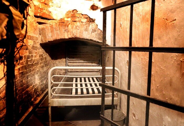Coxx Men's Bar, Budapest. Bunk bed inside a brick-lined alcove. Gay travel advice. Cell-like. Budapest gay bar. Men's bar.