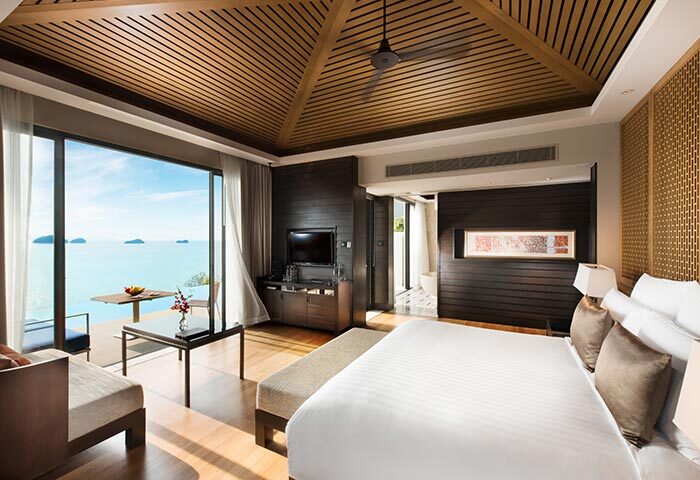 Conrad Koh Samui's gay-friendly luxury resort. A bedroom with a sea view and a private pool. A perfect gay travel destination.