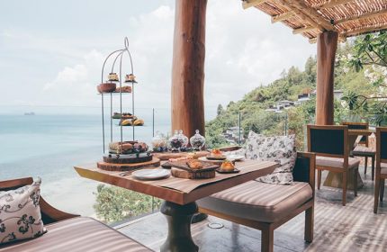 Conrad Koh Samui resort, Thailand. Afternoon tea with ocean view. Gay-friendly travel destination. Luxury dining experience in Koh Samui.