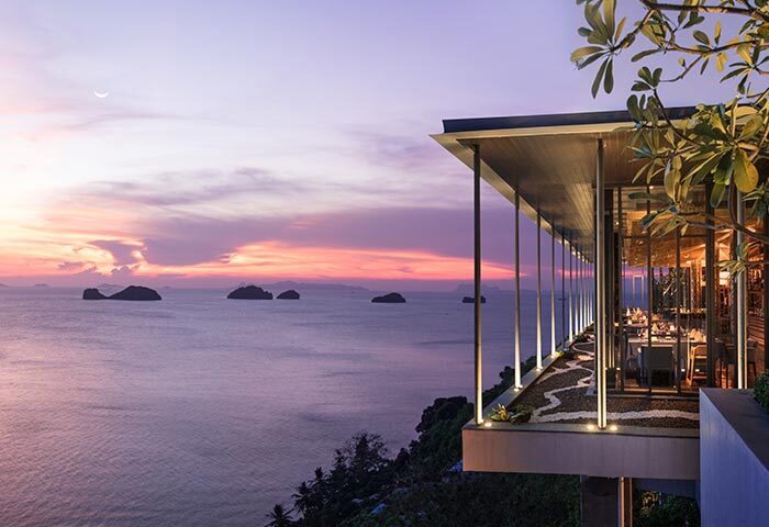 Conrad Koh Samui luxury hotel restaurant at sunset. Island views. Gay travel advice for romantic dining. Thailand vacation.