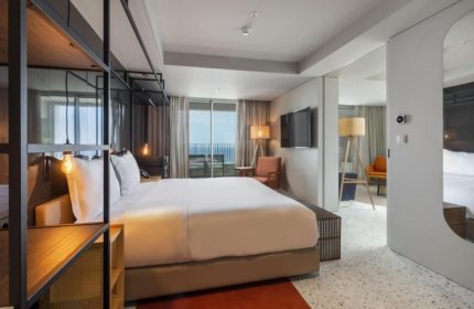 NEXT Hotel Madeira room. Modern gay-friendly beach hotel in Portugal. Balcony with ocean view. Coolest hotel on TikTok.