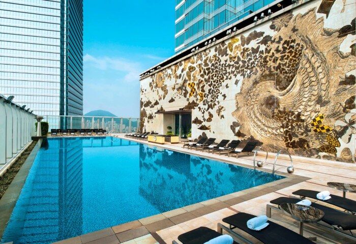 W Hong Kong's rooftop pool. One of the coolest gay hotels in Hong Kong. Enjoy swimming with a view. Perfect for gay travelers.