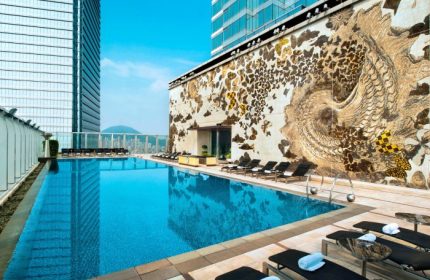 W Hong Kong's rooftop pool. One of the coolest gay hotels in Hong Kong. Enjoy swimming with a view. Perfect for gay travelers.