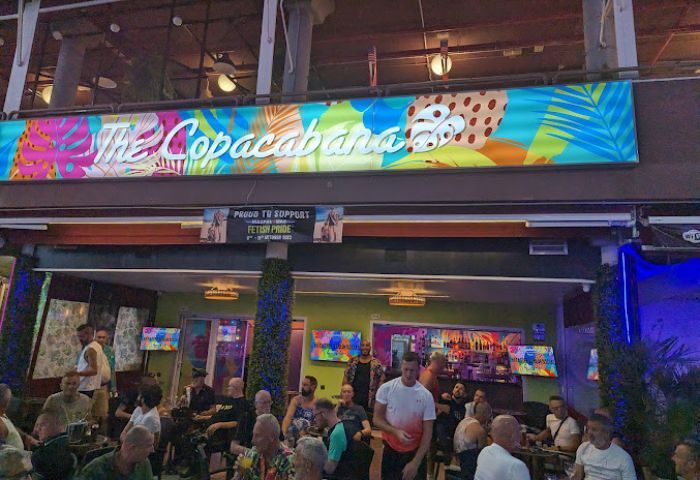 Copacabana Gay Bar in Gran Canaria. Exterior view of the gay bar with people. Gay travel advice in Gran Canaria.