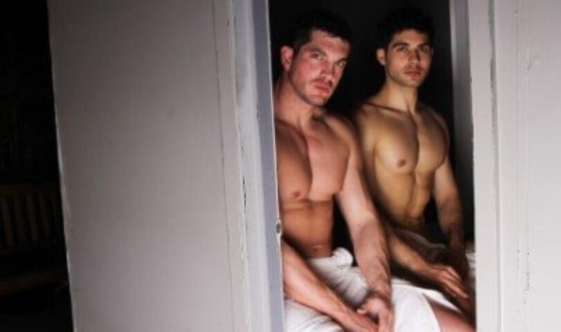 Covent Garden Health Spa: Two shirtless men in towels at a gay sauna. London gay travel advice.