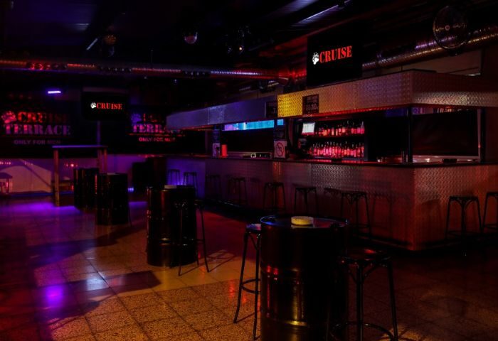 Interior of Cruise Bar, a gay cruise club in Gran Canaria. The club features a bar, dance floor, and terrace for men only. Nightlife.