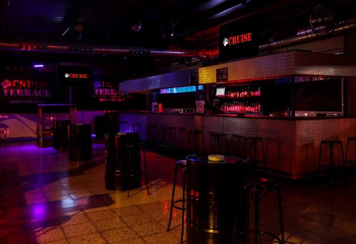 Interior of Cruise Bar, a gay cruise club in Gran Canaria. The club features a bar, dance floor, and terrace for men only. Nightlife.