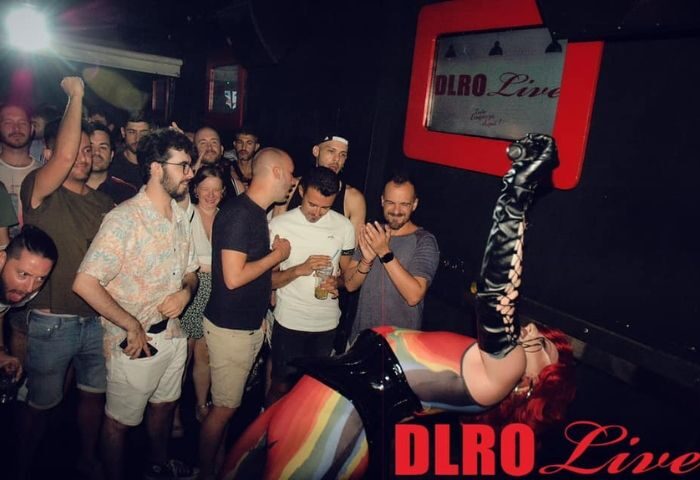 DLRO Live Gay Club in Madrid: A drag queen performs for a crowd of gay men at the DLRO nightclub in Madrid, Spain. Nightlife scene.